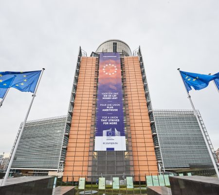 The Berlaymont building with a banner of the new Commission of Ursula von der Leyen